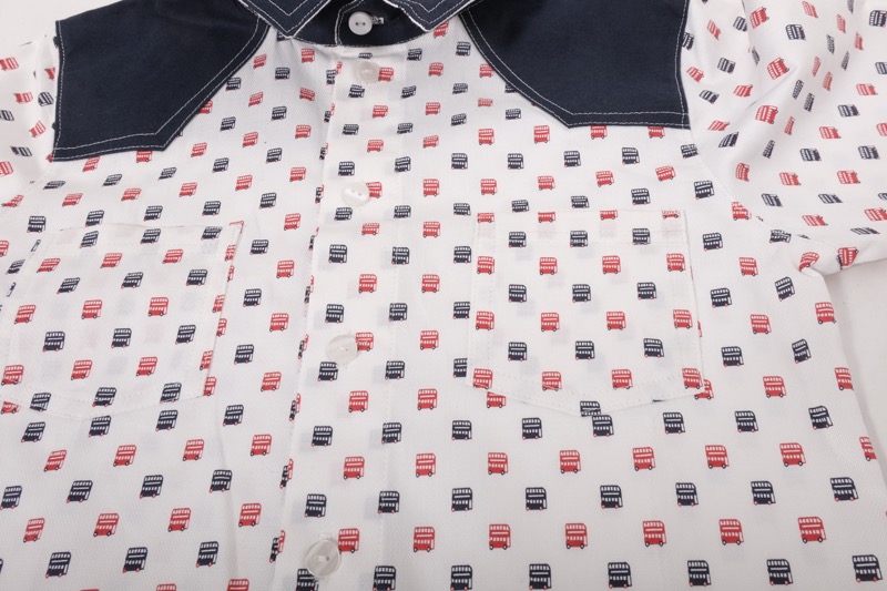 Baumwollstoff mit eingewebten Doppeldecker Bussen auf Weiß – Bild 3