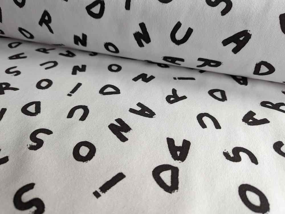 French Terry, Sweatshirtstoff, ABC in schwarzer Schrift auf Weiß